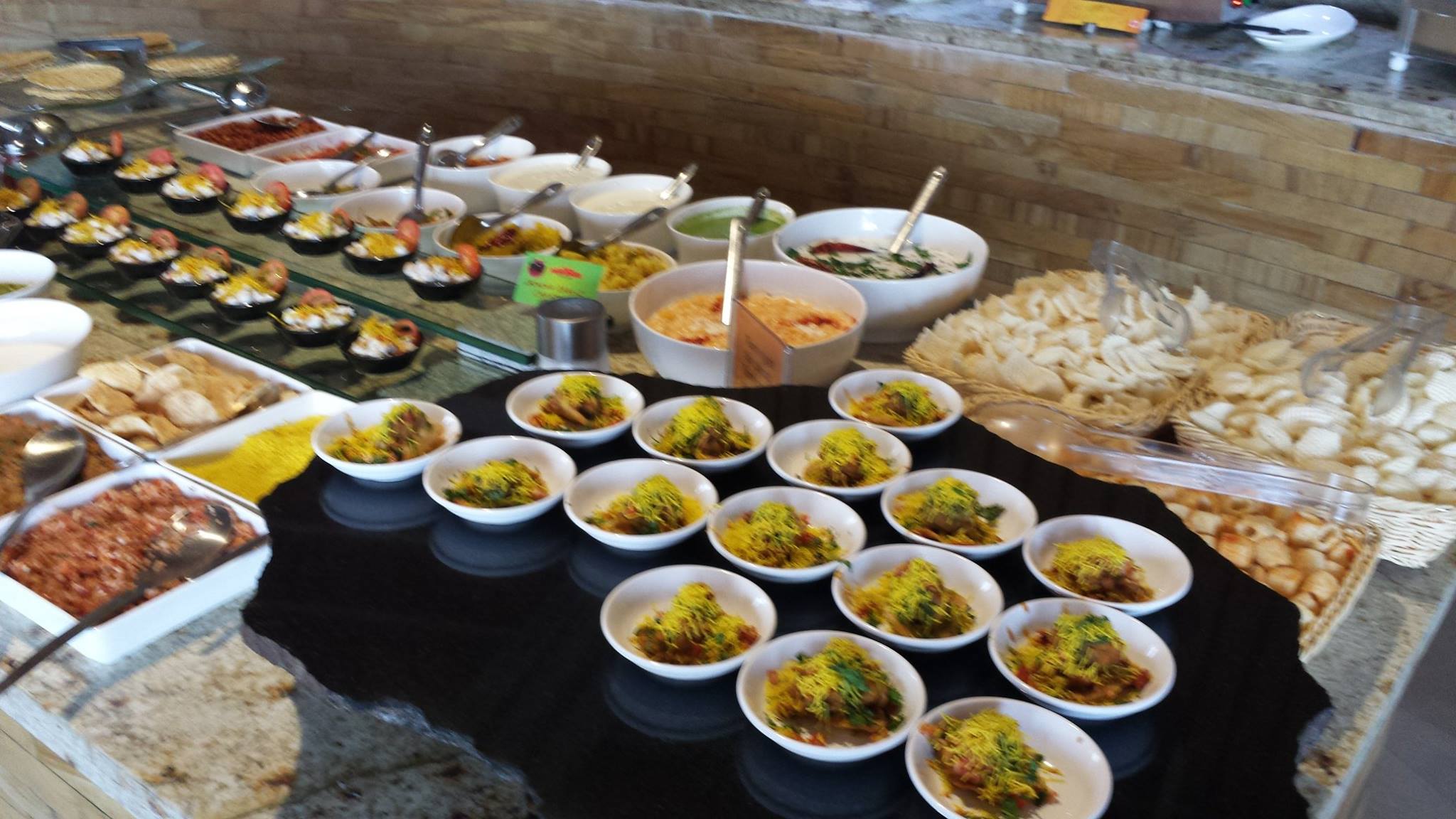 Outdoor catering buffet setup in Chennai with fresh delicacies and appetizers